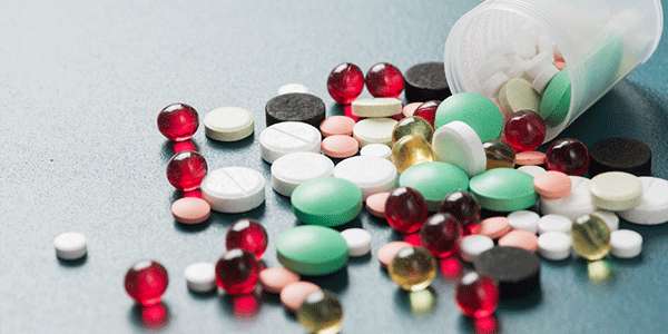 various-Pharmaceutical-medicine-pills-on-table